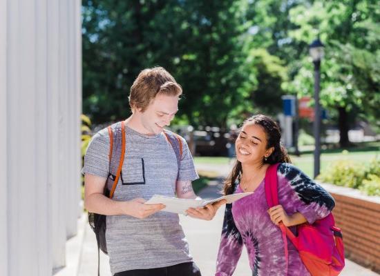 students talking outside